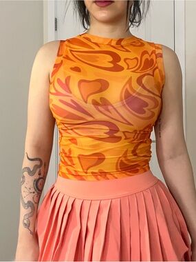 Sleeveless Orange Swirl Print Crop Top